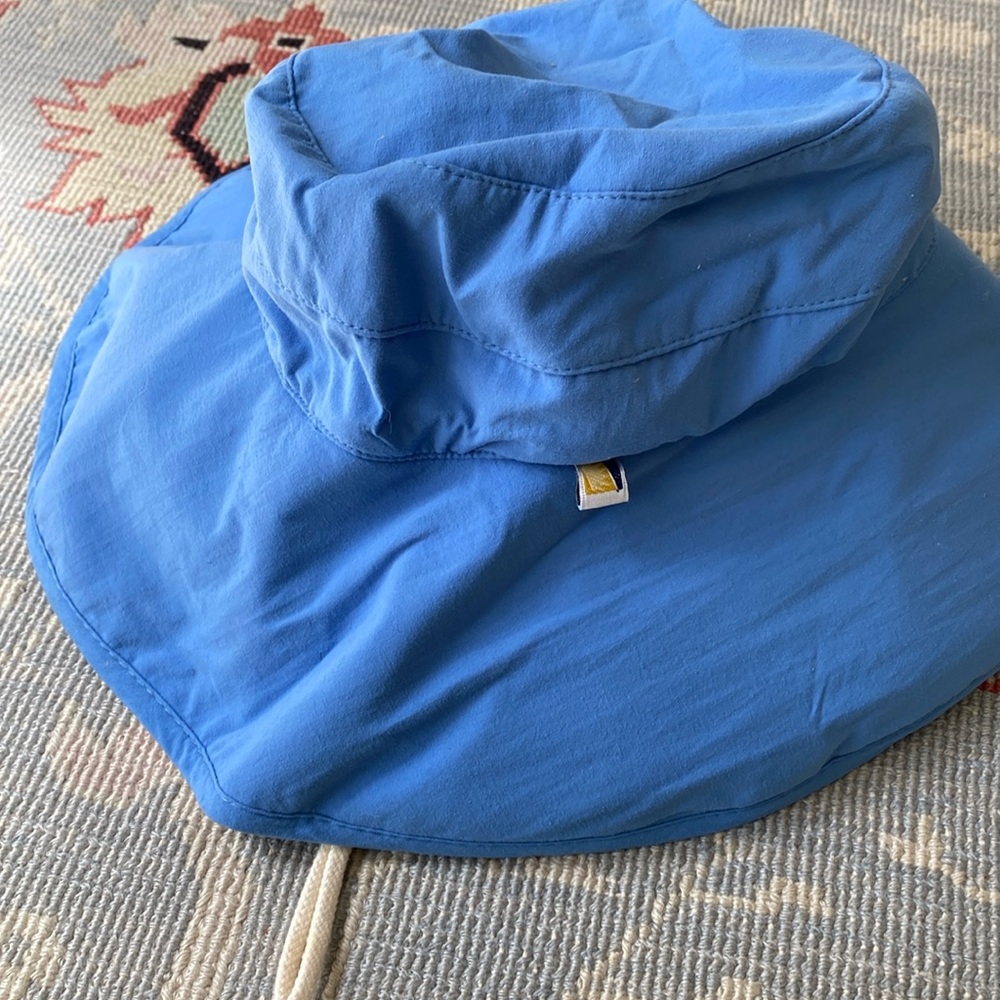 Periwinkle blue solumbra hat with drawstring